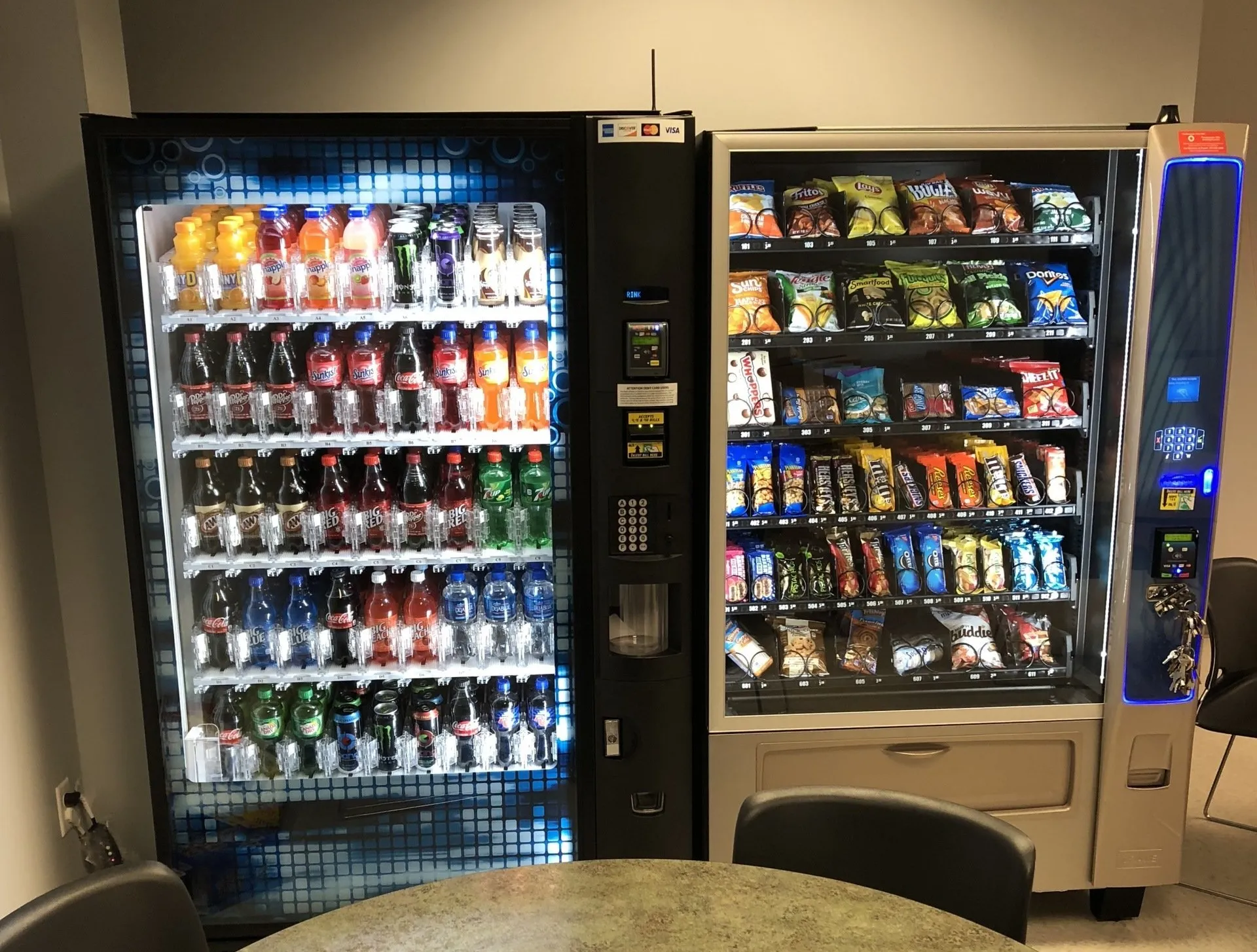 A vending machine with many different drinks on the shelves.