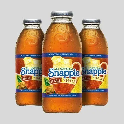 Three bottles of snapple are shown in a row.