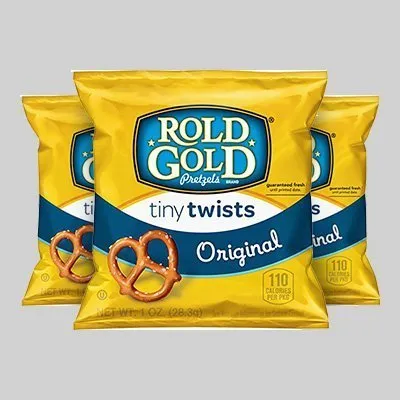 Three bags of pretzels are shown in a yellow package.